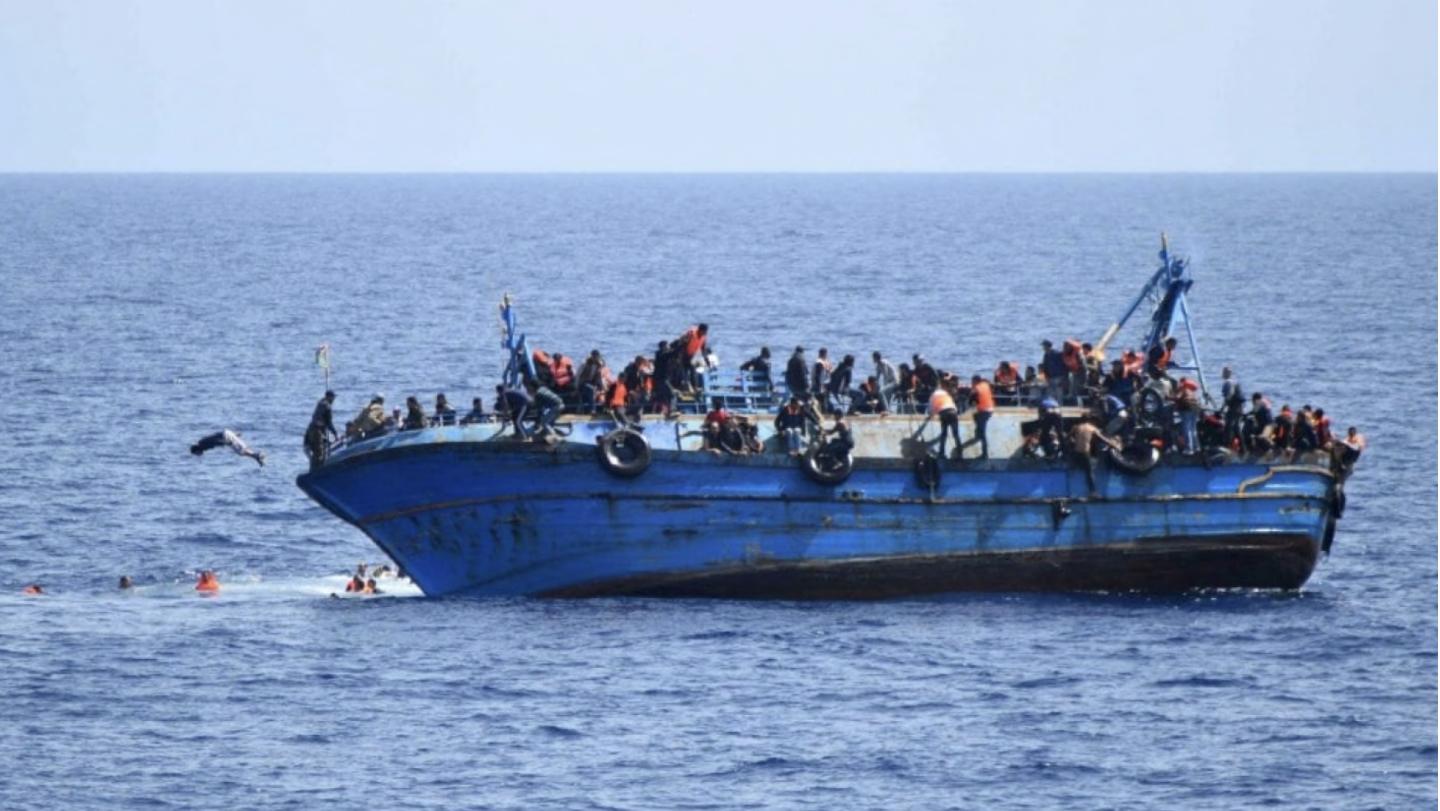 FILE PIC: Migrants in the Mediterranean Sea. /AFP