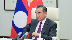 Chinese FM meets Lao counterpart via video - CGTN