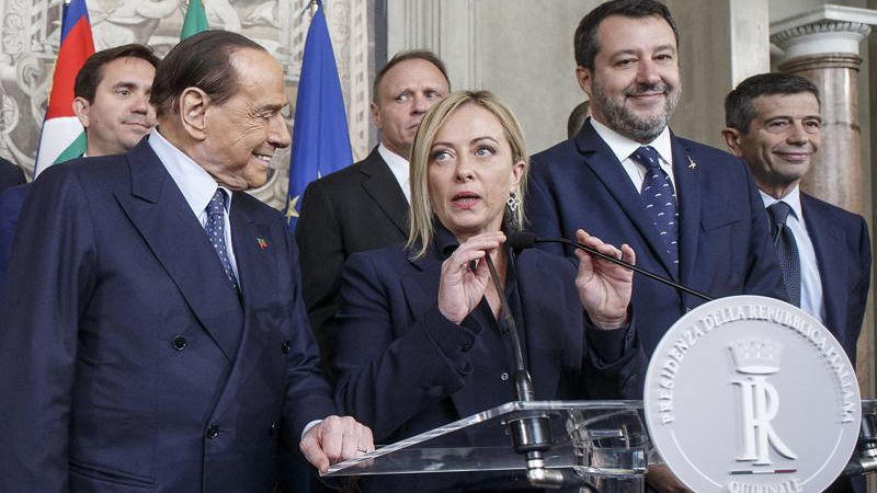Giorgia Meloni, center, speaks to the press at the Quirinale Presidential Palace after talks with Italian President Sergio Mattarella, Friday, Oct. 21, 2022. /AP