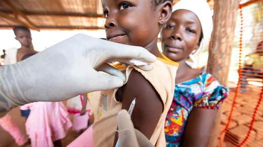 A child is given a measles vaccination during an emergency campaign in northern Democratic Republic of Congo, March 3, 2020. /Reuters