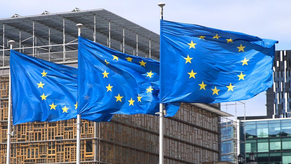 Flags of the European Union fly outside the EU headquarters in Brussels, Belgium, May 21, 2021. /Xinhua