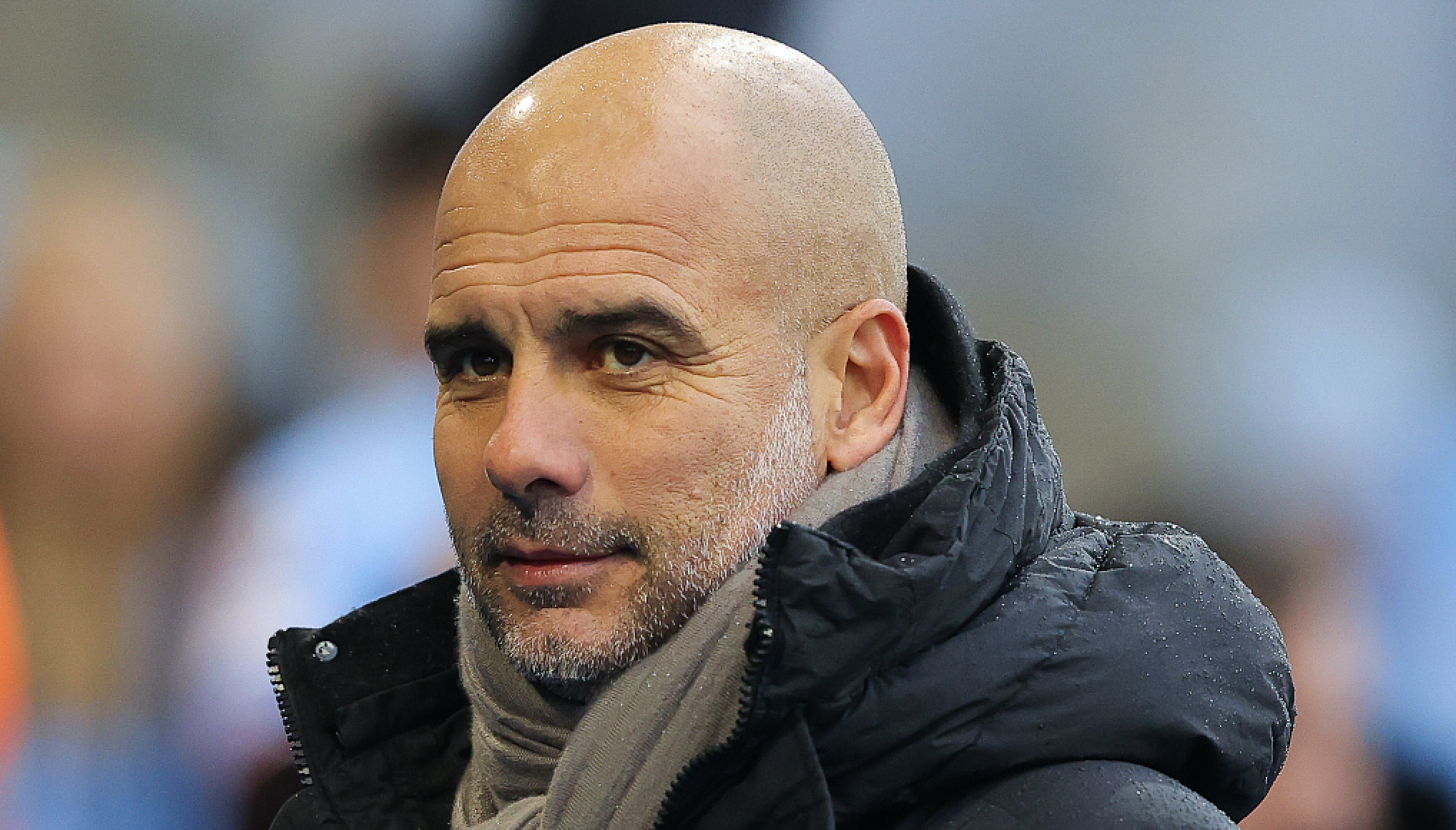 Manchester City manager Pep Guardiola looks on ahead of the friendly match between Manchester City and Girona at Manchester City Academy Stadium on December 17, 2022 in Manchester, England. /Getty