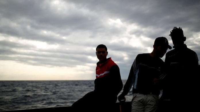 FILE PIC: Migrants in the Mediterranean Sea. /AFP