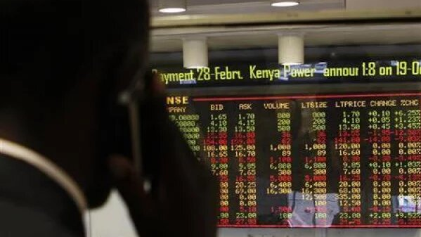 FILE PIC: A stockbroker transacts shares during a trading session at the Nairobi Securities Exchange in Kenya's capital /Reuters