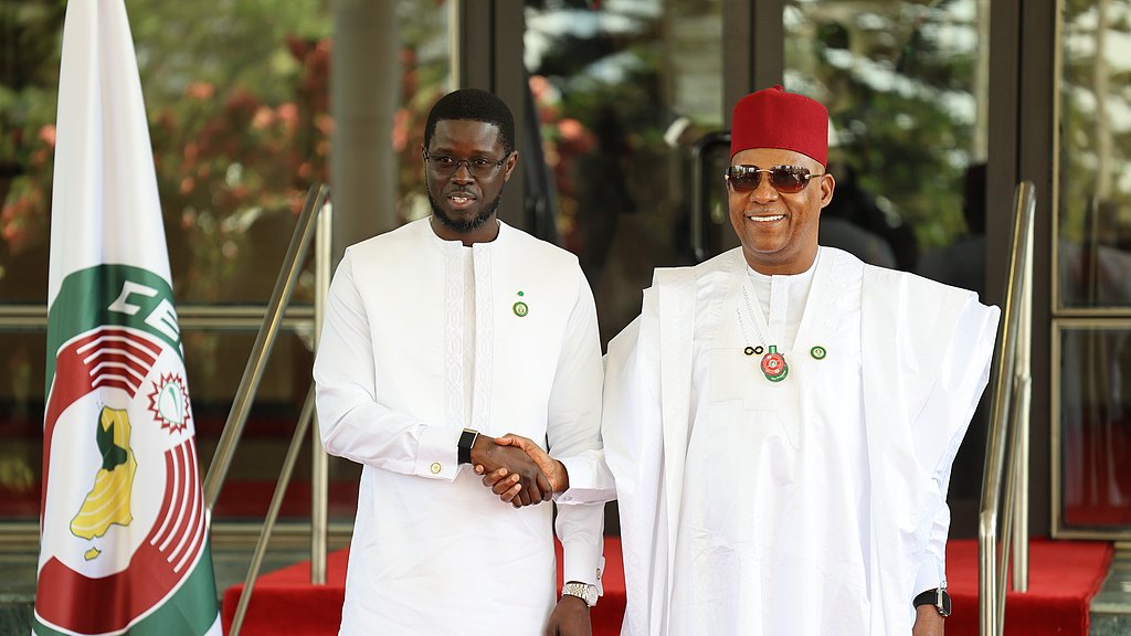 Nigeria's Vice President Kashim Shettima (R) greets Senegal's President Bassirou Diomaye Faye (L) during the 68th Ordinary Session of the Conference of Heads of State and Government of ECOWAS. /CFP
