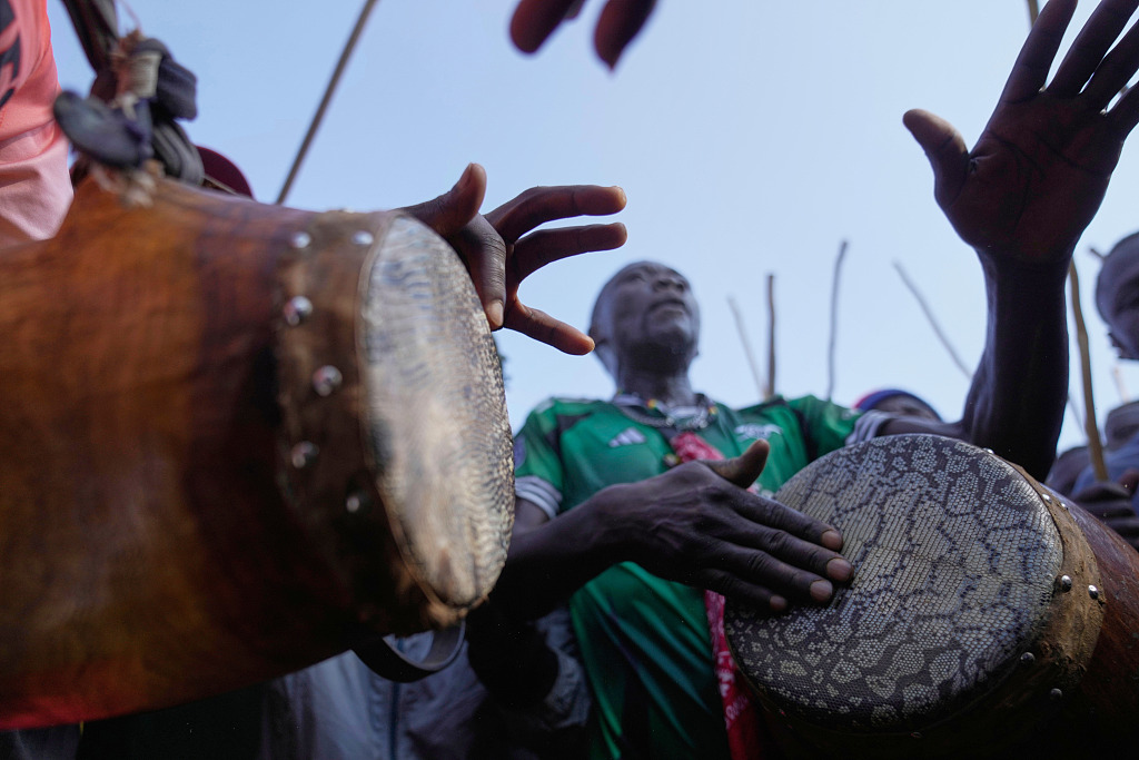 Spectators dance and sing to the isukuti traditional dance in Kakamega County, western Kenya. /CFP
