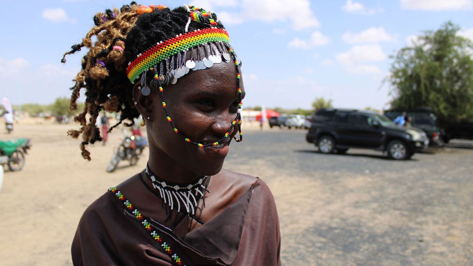 A pastoral woman from the Turkana community wearing colorful headgear at the Turkana Cultural Festival. /CGTN Africa 