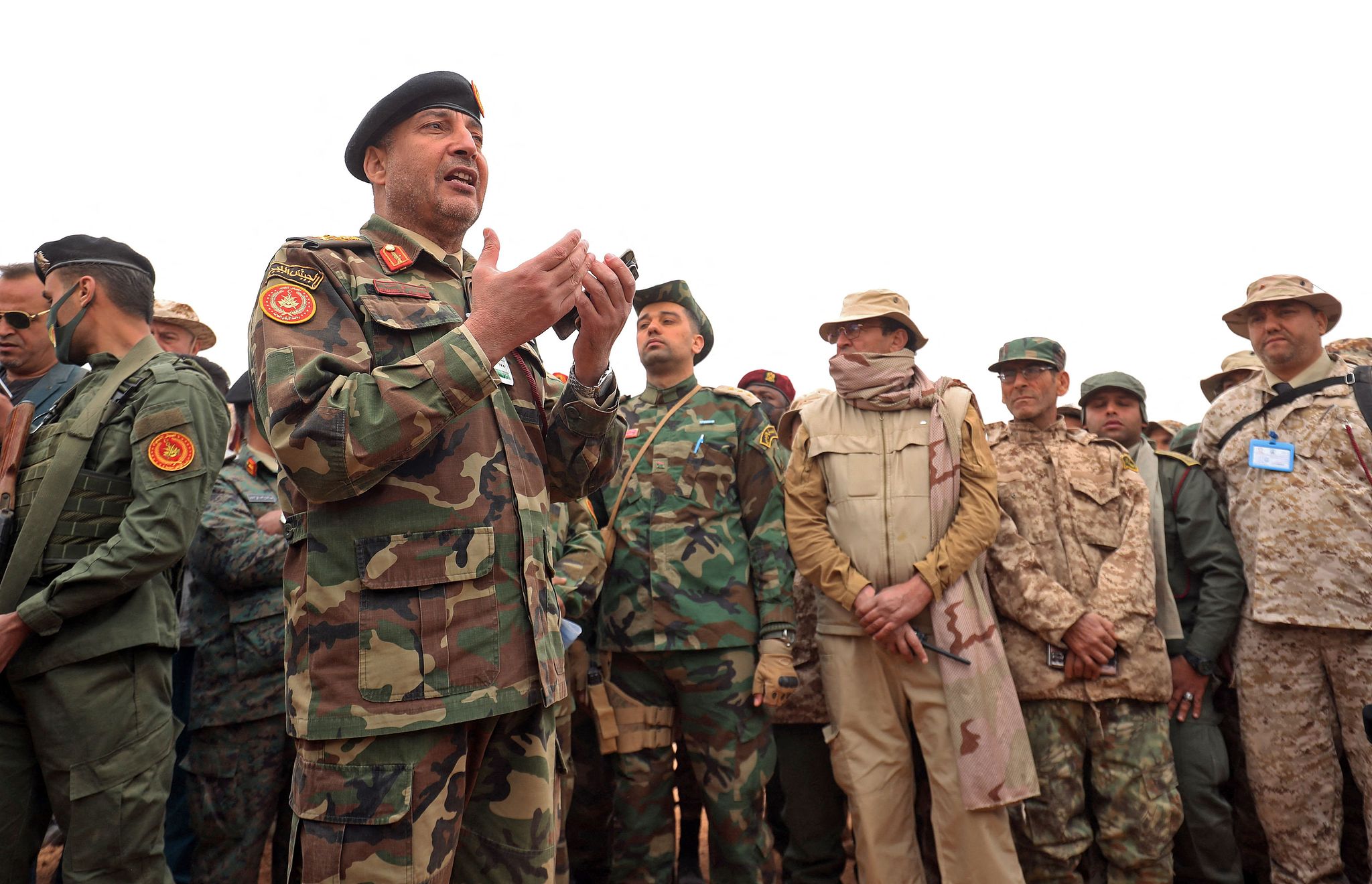 FILE: Lieutenant General Mohammed Ali al-Haddad (C-L), chief of the general staff of the Libyan army, attends a defense exercise for members of Libya's Petroleum Facilities Guard near the town of Bir al-Ghanam, about 100 kilometers southwest of Libya's capital Tripoli, March 22, 2021. /CFP