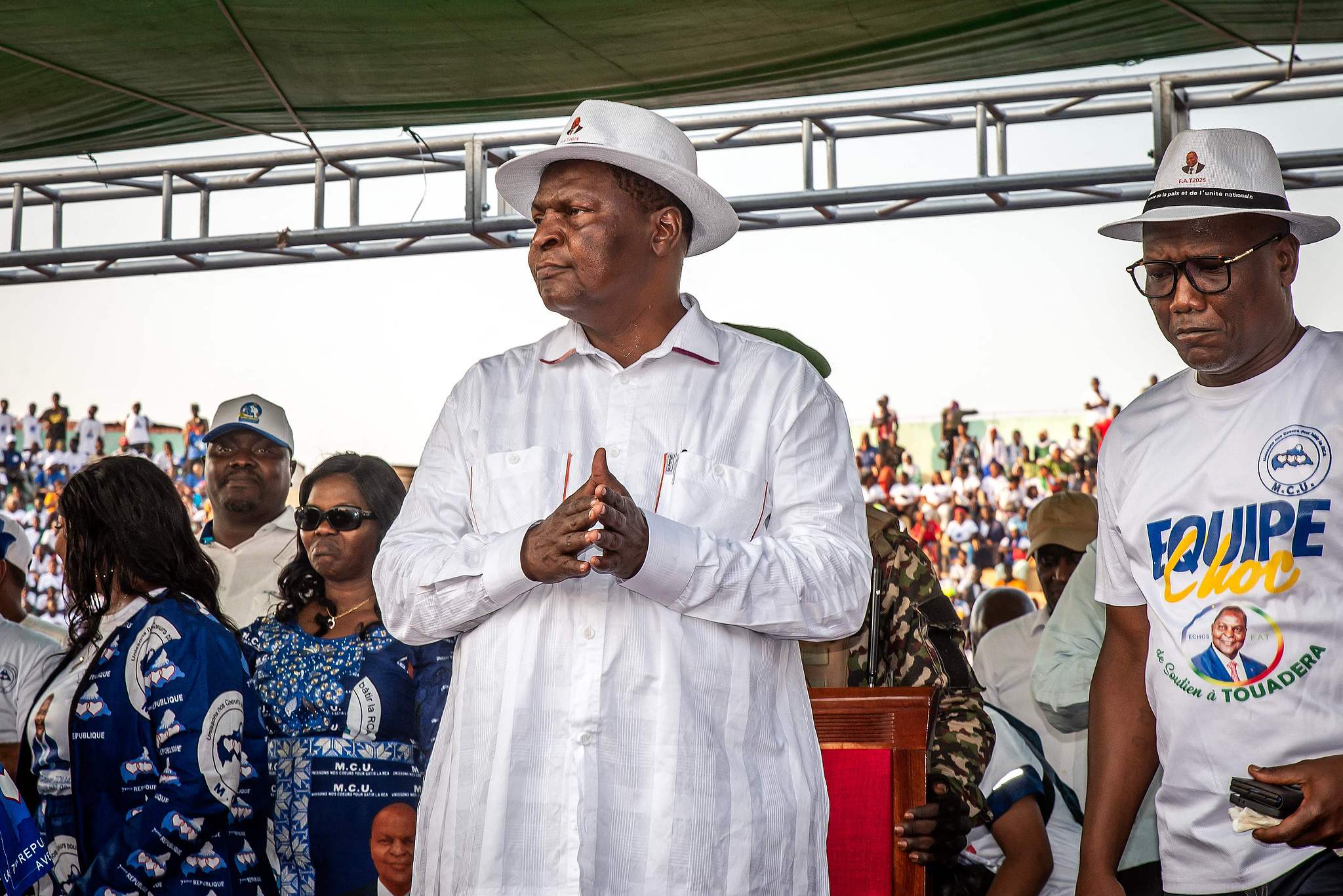 FILE: President of the Central African Republic and United Hearts Movement (MCU) presidential candidate, Faustin-Archange Touadera (C), reacts on stage during the launch of the electoral campaign in Bangui on December 13, 2025, ahead of the Central African Republic general elections scheduled for December 28, 2025. /CFP