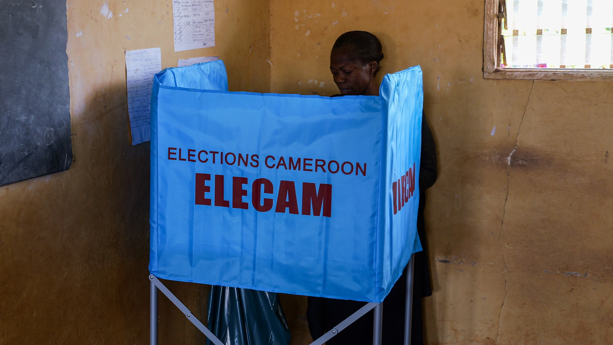 File Photo: A woman casts her vote for president in Yaounde, Cameroon, on October 12, 2025. /CFP