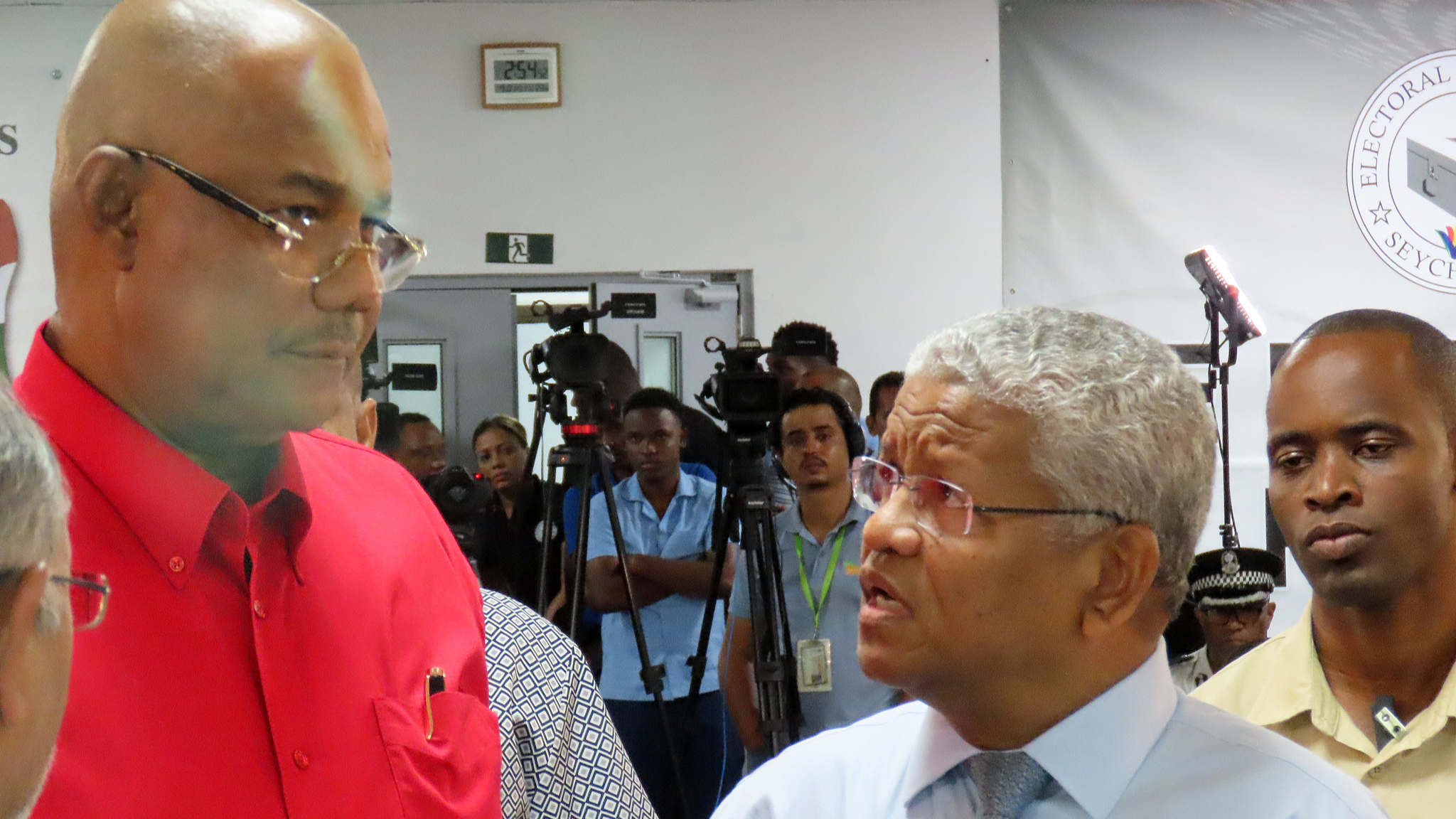 File Photo: Patrick Herminie, left, speaks with Wavel Ramkalawan, right, after winning in the runoff presidential election at Mont Fleuri Secondary School polling station in Victoria, Seychelles, on Sunday, October 12, 2025. /CFP