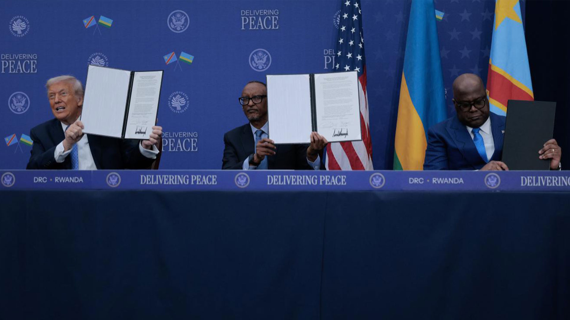 US President Donald Trump hosts Rwandan President Paul Kagame (C) and Democratic Republic of Congo President Felix Tshisekedi (R) at the Donald J. Trump Institute of Peace on December 4, 2025, in Washington, DC. / CFP