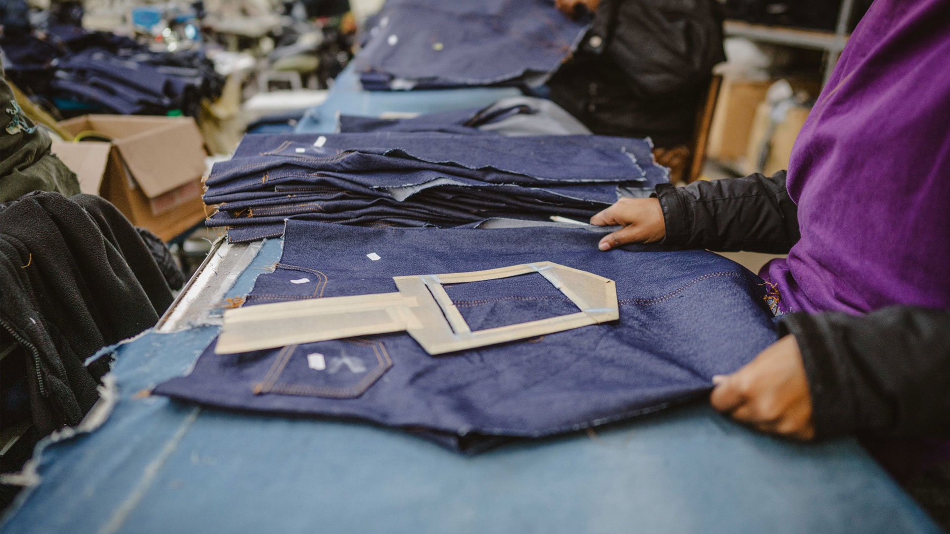 A worker prepares denim cloth at the Afri-Expo Textiles Ltd. denim factory in Maseru, Lesotho, on Thursday, July 24, 2025. /CFP