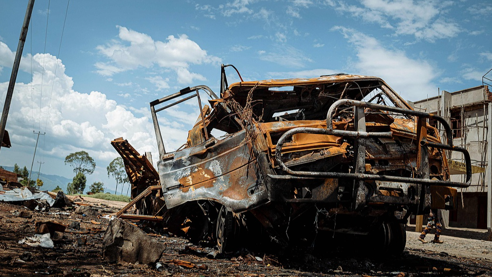 On December 13, 2025, in Luvengi, Democratic Republic of Congo, a burned military vehicle belonging to the Armed Forces of the Democratic Republic of Congo (FARDC) lay parked on the roadside. /CFP