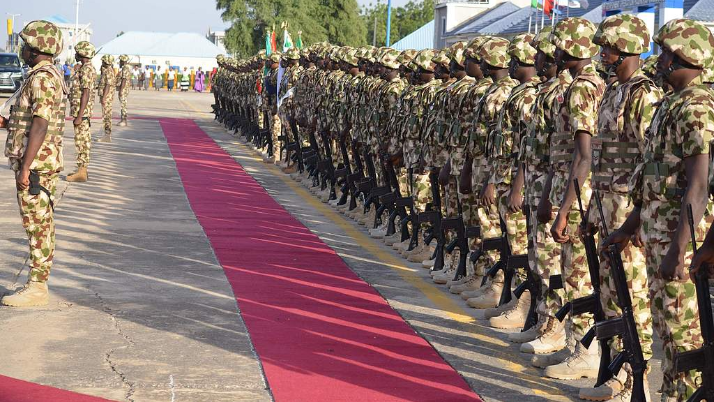 Troops from operation Hadin Kai Maimalari line up at the Aiir Force Base in Maiduguri on December 11, 2023 during Nigerian President Bola Tinubu visit to the start of the Chief of Army Staff (COAS) Annual Conference 2023. /CFP