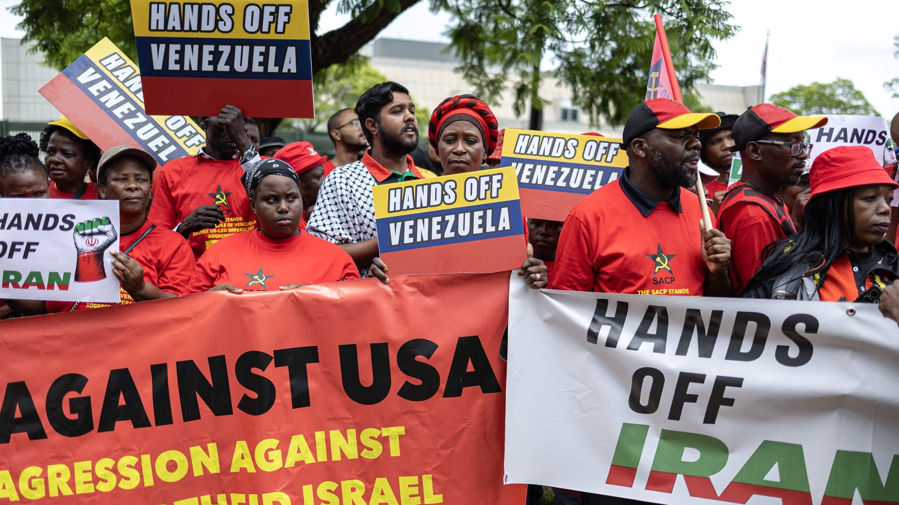 South Africans hold placards during a protest against the recent US operation in Venezuela that resulted in the seizure of the Venezuelan President, outside the US Embassy in Pretoria on January 8, 2026. /CFP