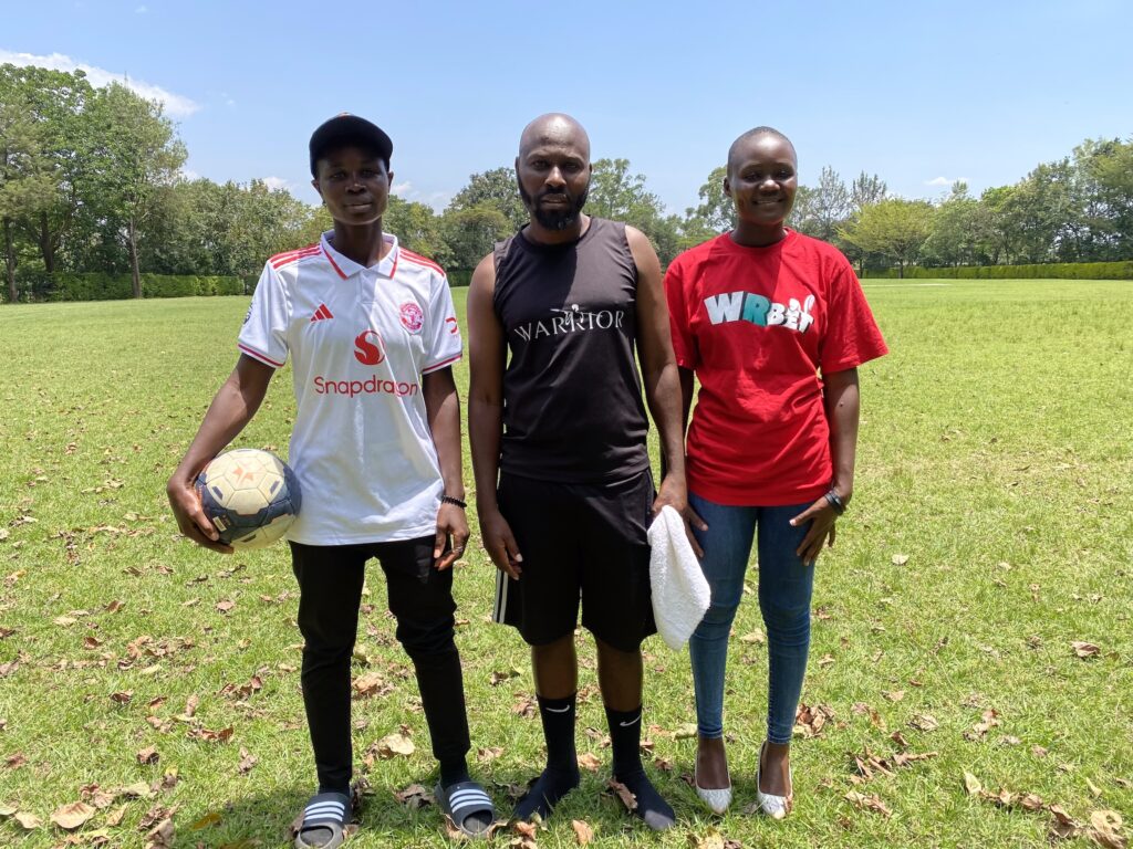 (From left to right): Western Star player Maximila Kadenge, Kenya national deaf women's football team head coach Hassan Hussein and Esther Eulolo pose for a photo. /CGTN reporter Gabriel Rotich