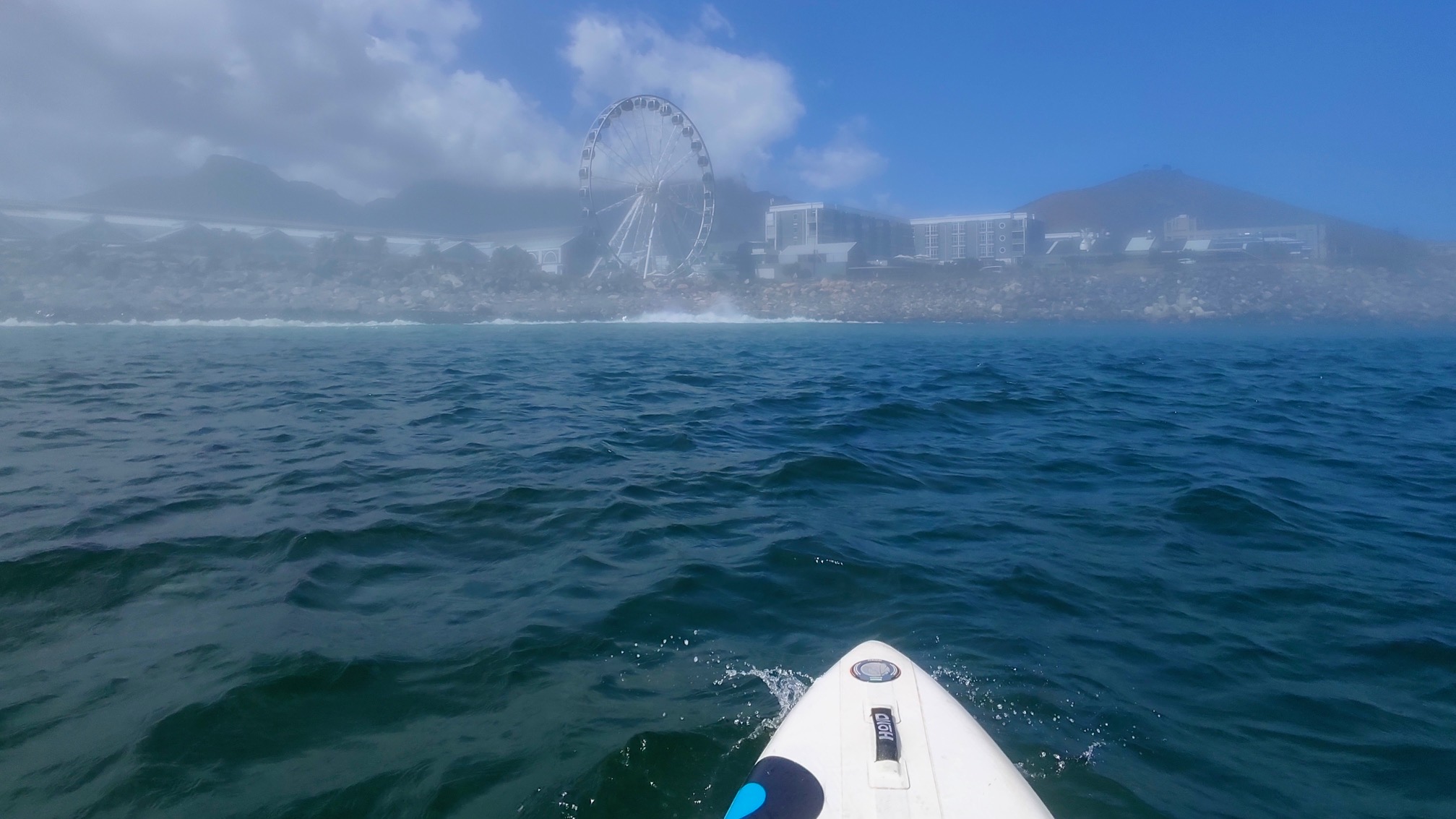 Africa in Pictures: Morning sea fog drapes Cape Town’s waterfront, slowing port activity