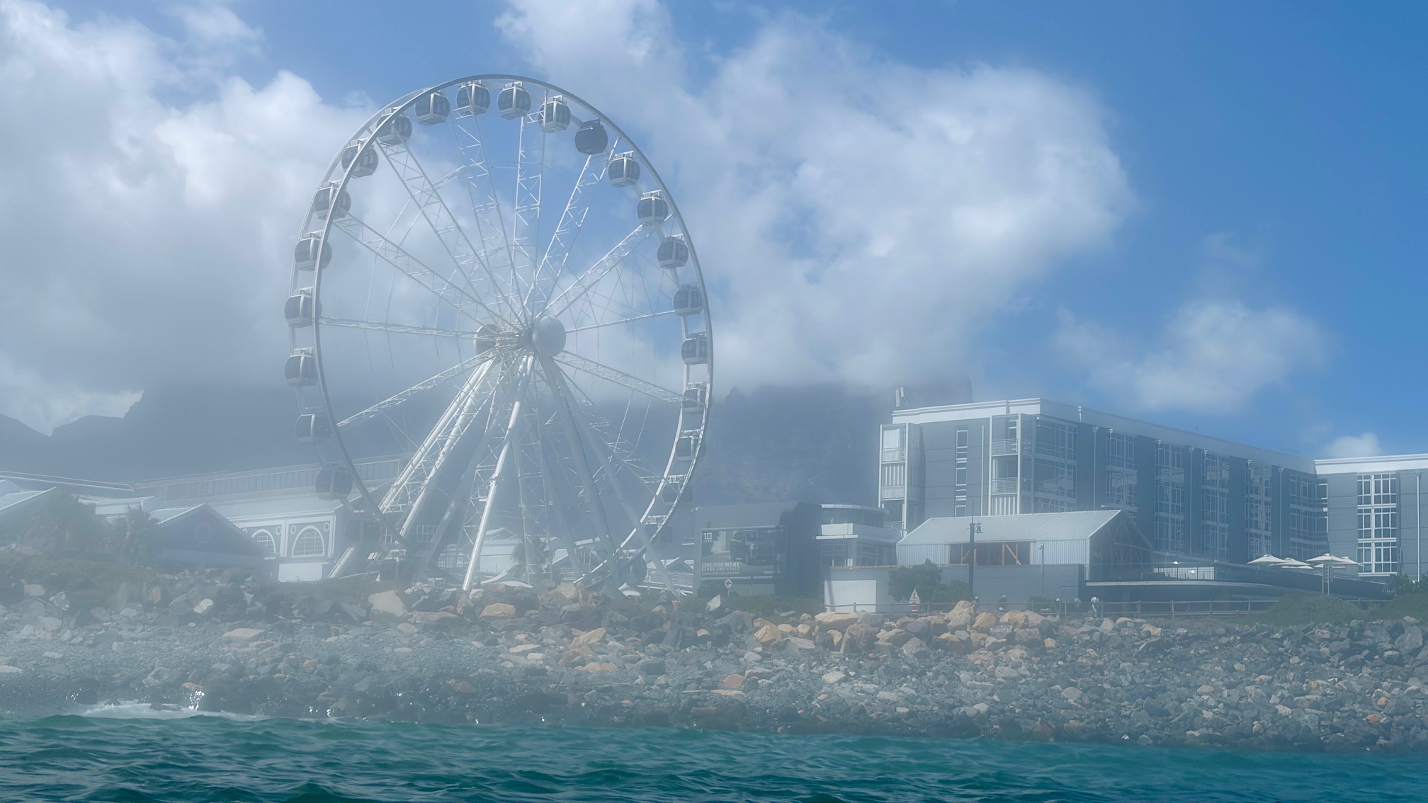 Africa in Pictures: Morning sea fog drapes Cape Town’s waterfront, slowing port activity