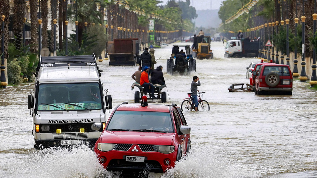Vehicles move along an inundated main street in Morocco's northwestern city of Ksar el-Kebir, as several neighborhoods flooded in the city due to a rise in the water level of the Loukkos River following recent heavy rainfall,  January 29, 2026. /CFP