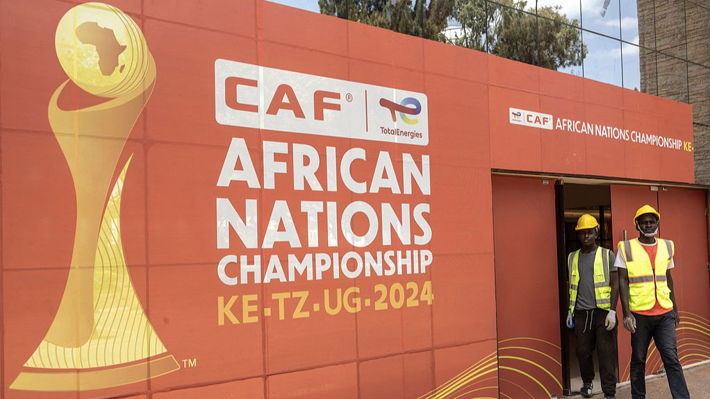 Construction workers exit the main gate at the Nyayo national stadium, Nairobi, Kenya, July 28, 2025. /VCG