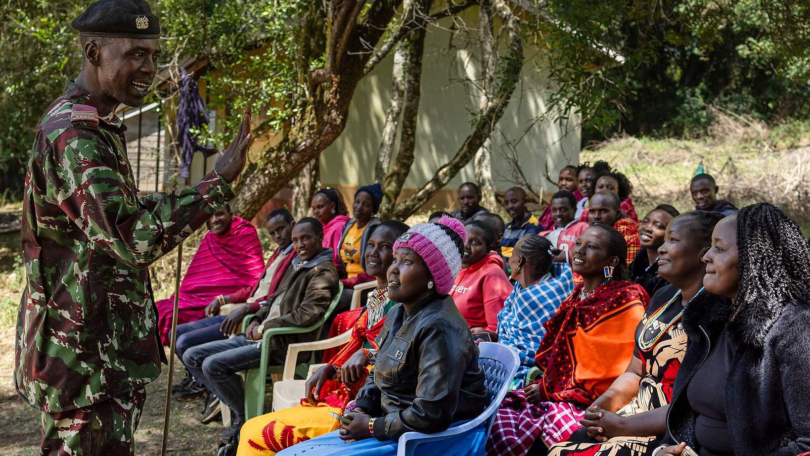 FILE: Assistant County Commissioner Bonifas Kirema (left) holds a dialogue with Maasai community members in the Loita district, Narok County, Kenya, against female genital mutilation and child marriage, December 2, 2025. /CFP