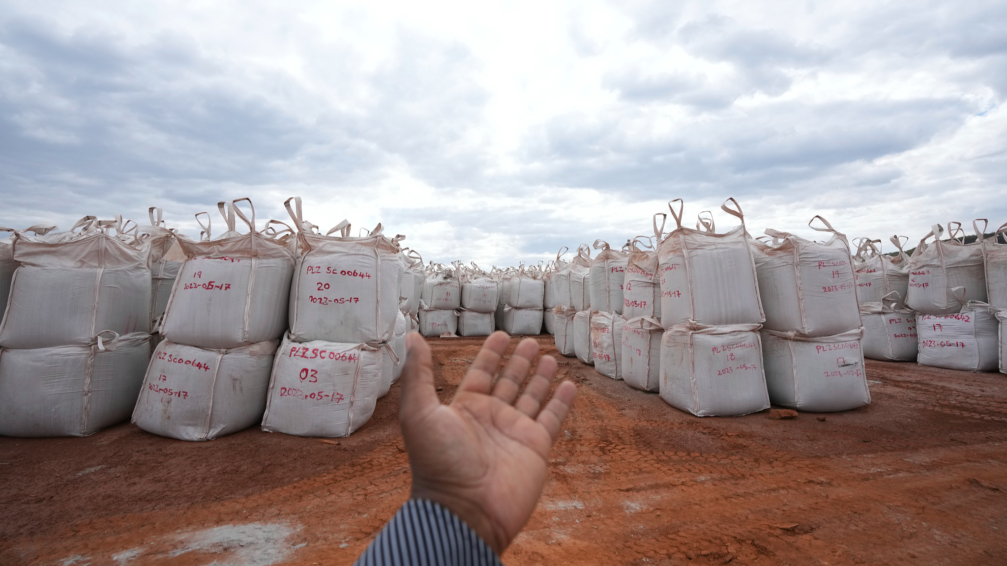 Bags filled with lithium ore lay on the ground at the Prospect Lithium Processing Plant in Goromonzi, Zimbabwe, July 5, 2023. /CFP