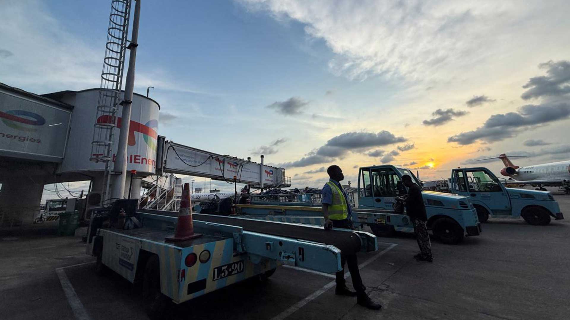 A baggage handler waits to transport luggage from a commercial plane at Terminal 2 of Murtala Muhammed International Airport in Lagos, Nigeria, on October 18, 2025. /Reuters