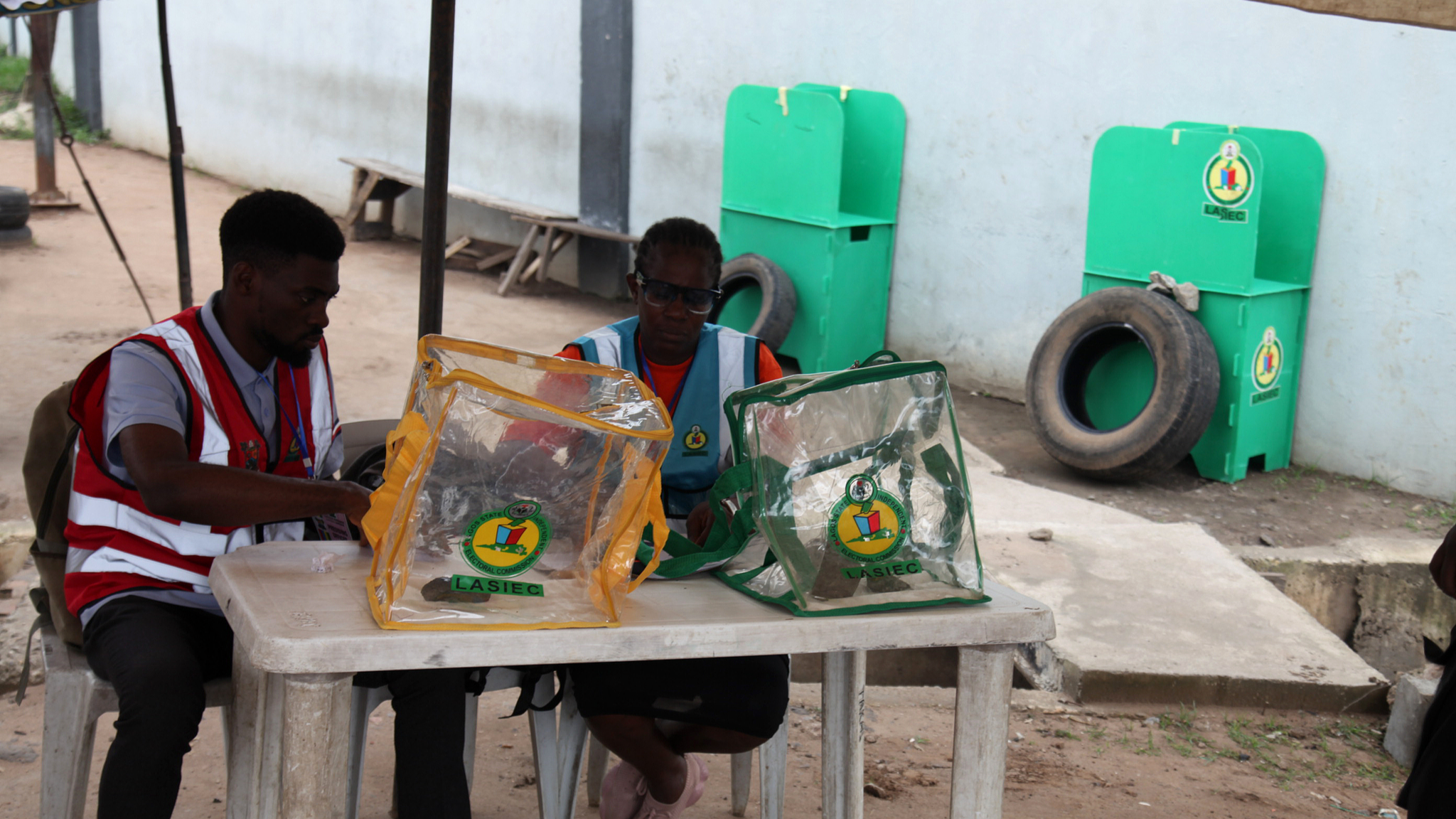 Officials of the Lagos State Independent Electoral Commission (LASIEC) wait for voters at a polling station in Ogba, Lagos, Nigeria, on July 12, 2025. /CFP