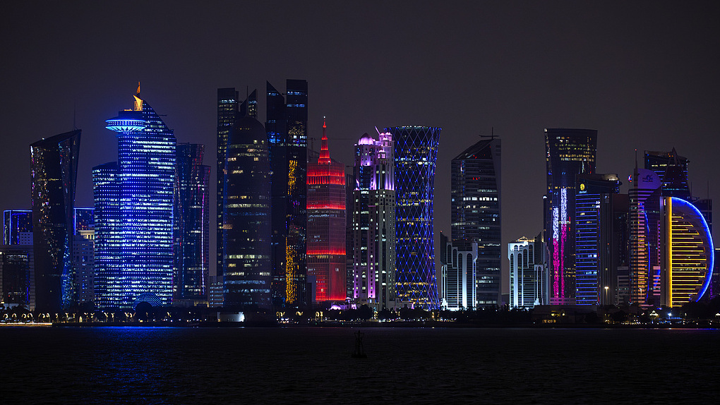 The skyline of the West Bay business district in Doha, Qatar, featuring modern skyscrapers and illuminated buildings, is seen from the Corniche waterfront promenade on March 2, 2026. /CFP