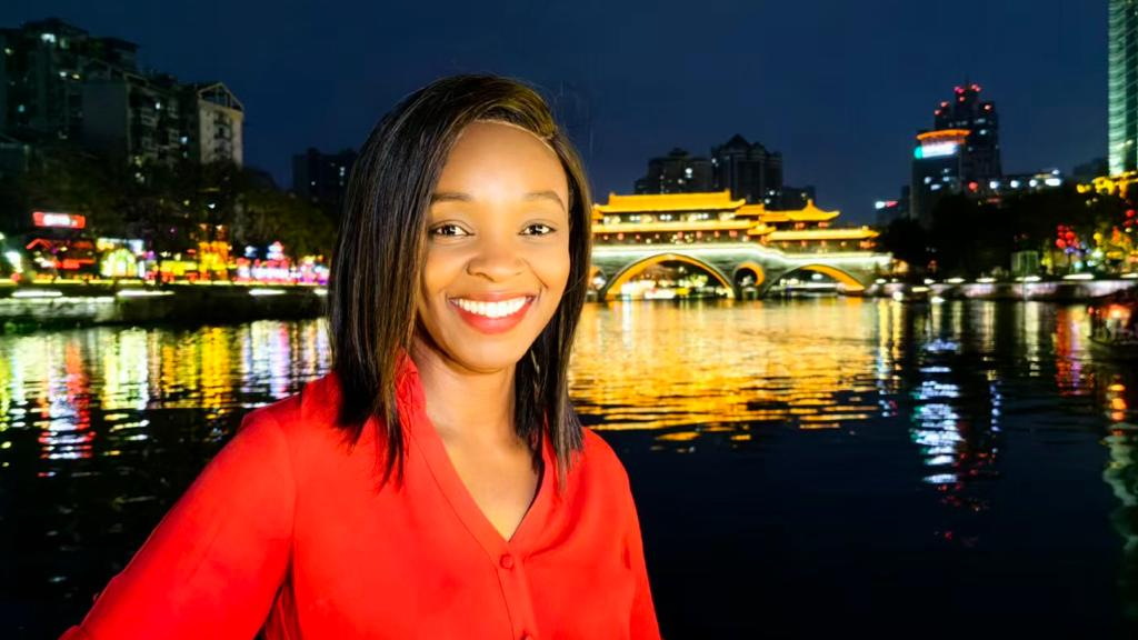CGTN's Peninah Karibe enjoying a river cruise on the Jinjiang River, Chengdu, China, February 25, 2026. /Eric Mukanga, CGTN