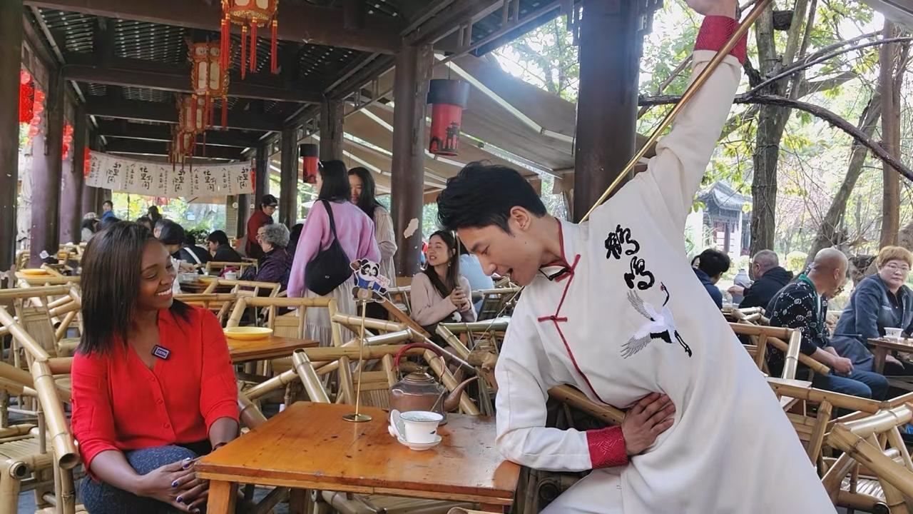 CGTN's Peninah Karibe enjoying the show at a Chengdu tea house, Chengdu, China, February 25, 2026. /Eric Mukanga, CGTN