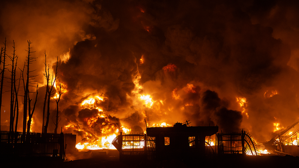 Fire breaks out at the Shahran oil depot after US and Israeli attacks, leaving numerous fuel tankers and vehicles in the area unusable in Tehran, Iran, March 8, 2026. /CFP