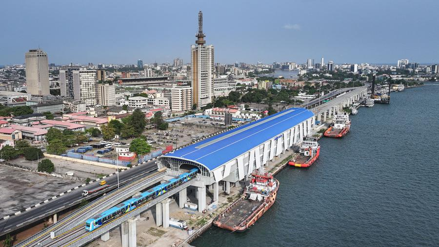An aerial drone photo taken on March 2, 2024 shows a train of the Lagos Rail Mass Transit Blue Line pulling in the Marina Station in Lagos, Nigeria. /Xinhua