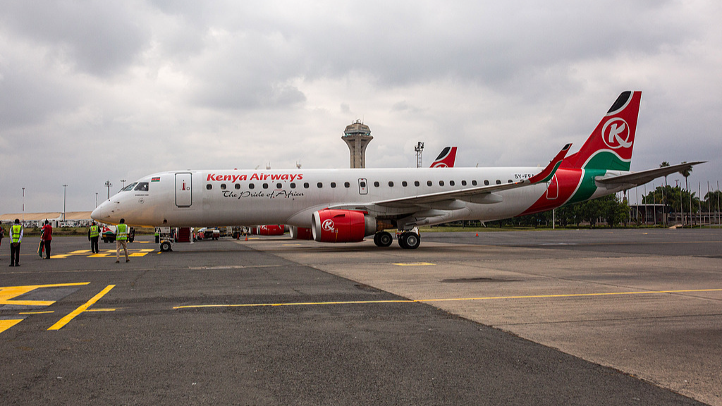 A passenger aircraft, operated by Kenya Airways Ltd., stands on the tarmac during a reopening ceremony at Jomo Kenyatta International Airport in Nairobi, Kenya, July 15, 2020. /CFP