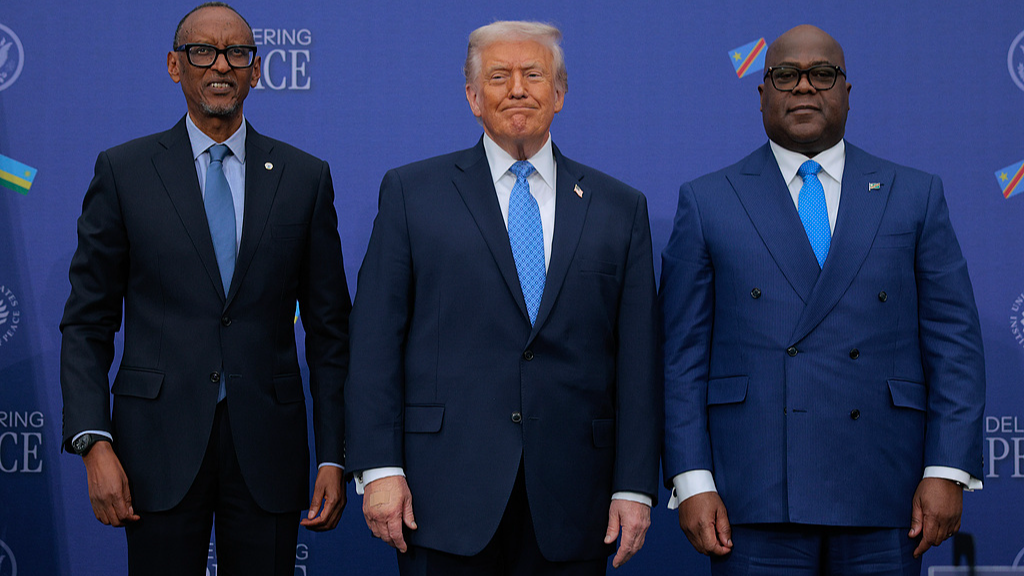 File: US President Donald Trump (C) poses for photographs with Rwandan President Paul Kagame (L) and Democratic Republic of Congo President Felix Tshisekedi after signing a peace accord at the Donald J. Trump Institute of Peace in Washington, DC, December 04, 2025 . /CFP