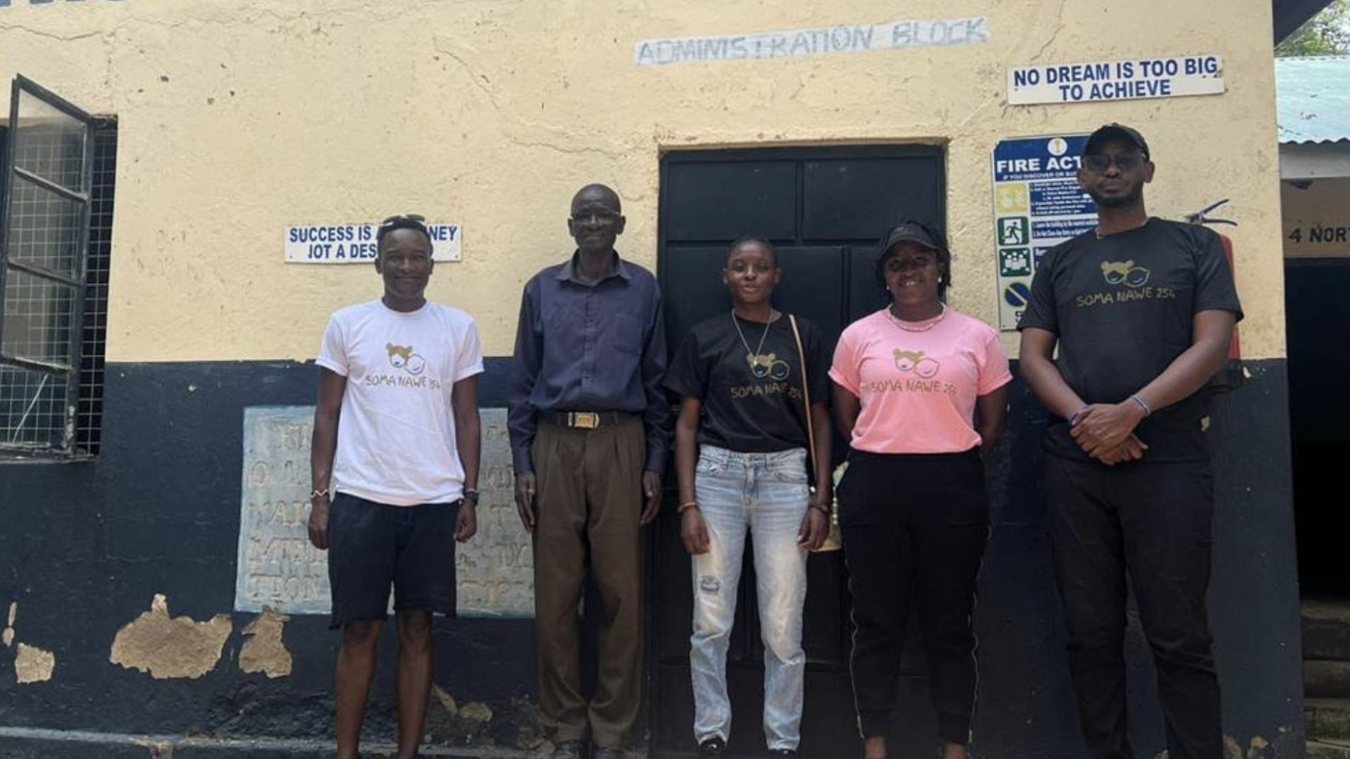 The Soma Nawe 254 team stands in front of the administration block at St Benedict High School in Budalangi, Kenya, on March 4, 2026. /Supplied