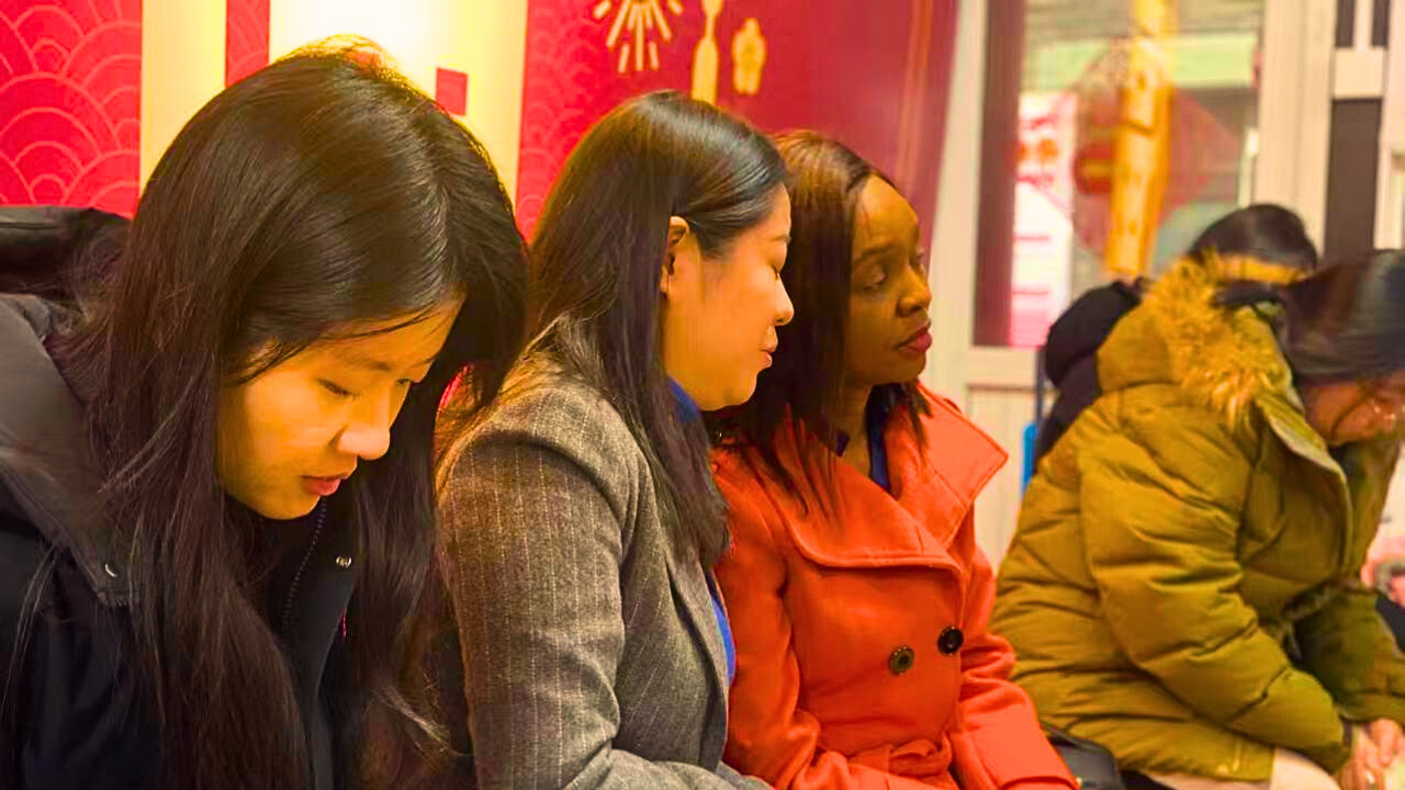 Peninah Karibe pictured while attending a courtyard meeting in Cauchong Hutong in Beijing, China, in March 2026. /CGTN
