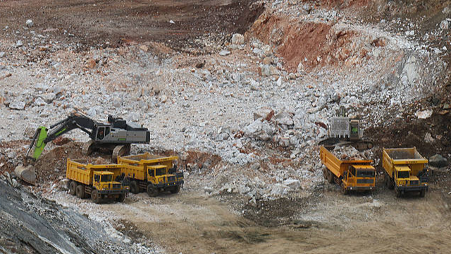 Earth moving vehicles operate during a lithium mining process at Sandawana Mines in Mberengwa, Zimbabwe, November 19, 2025. /CFP