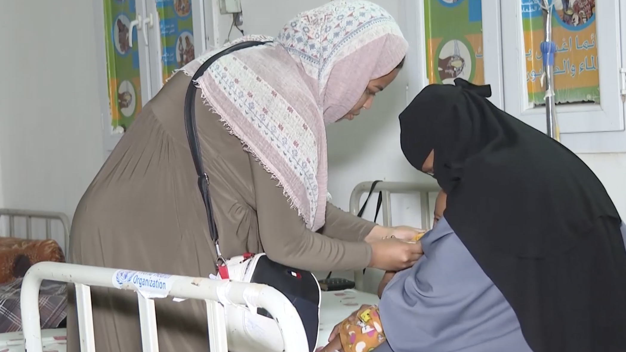A nurse administers a jab to a child at a clinic in Port Sudan on March 27, 2026. /CGTN