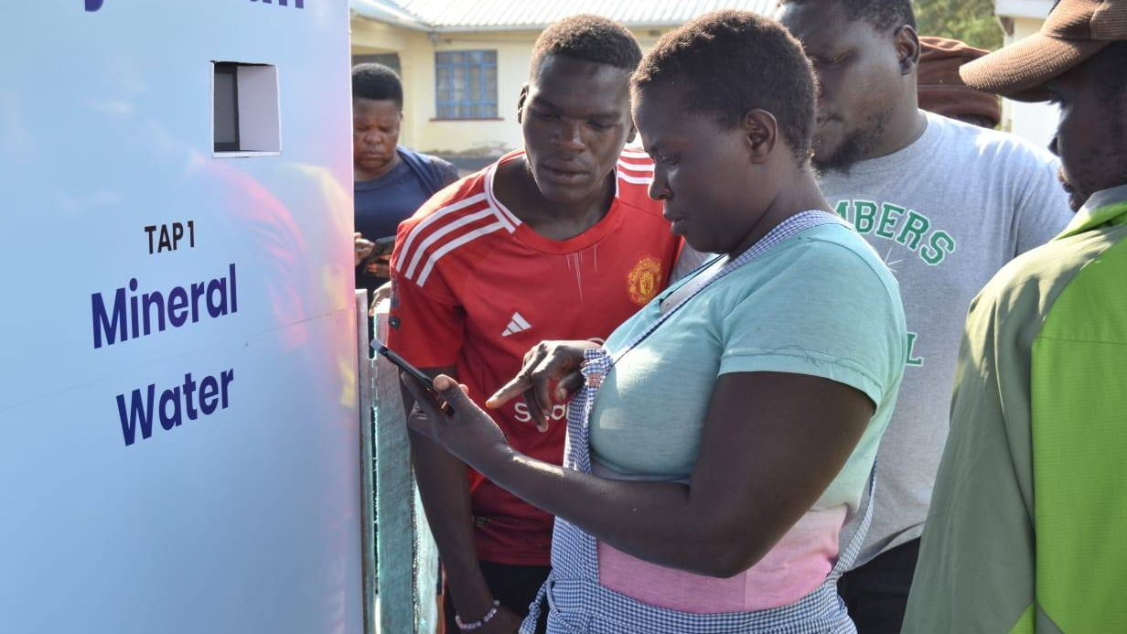 Residents use a Wable Maji Safi Solutions refill station and a tokenized prepaid system to access clean water in Homa Bay County, Kenya, September 9, 2025. /Wable Maji Safi Solutions