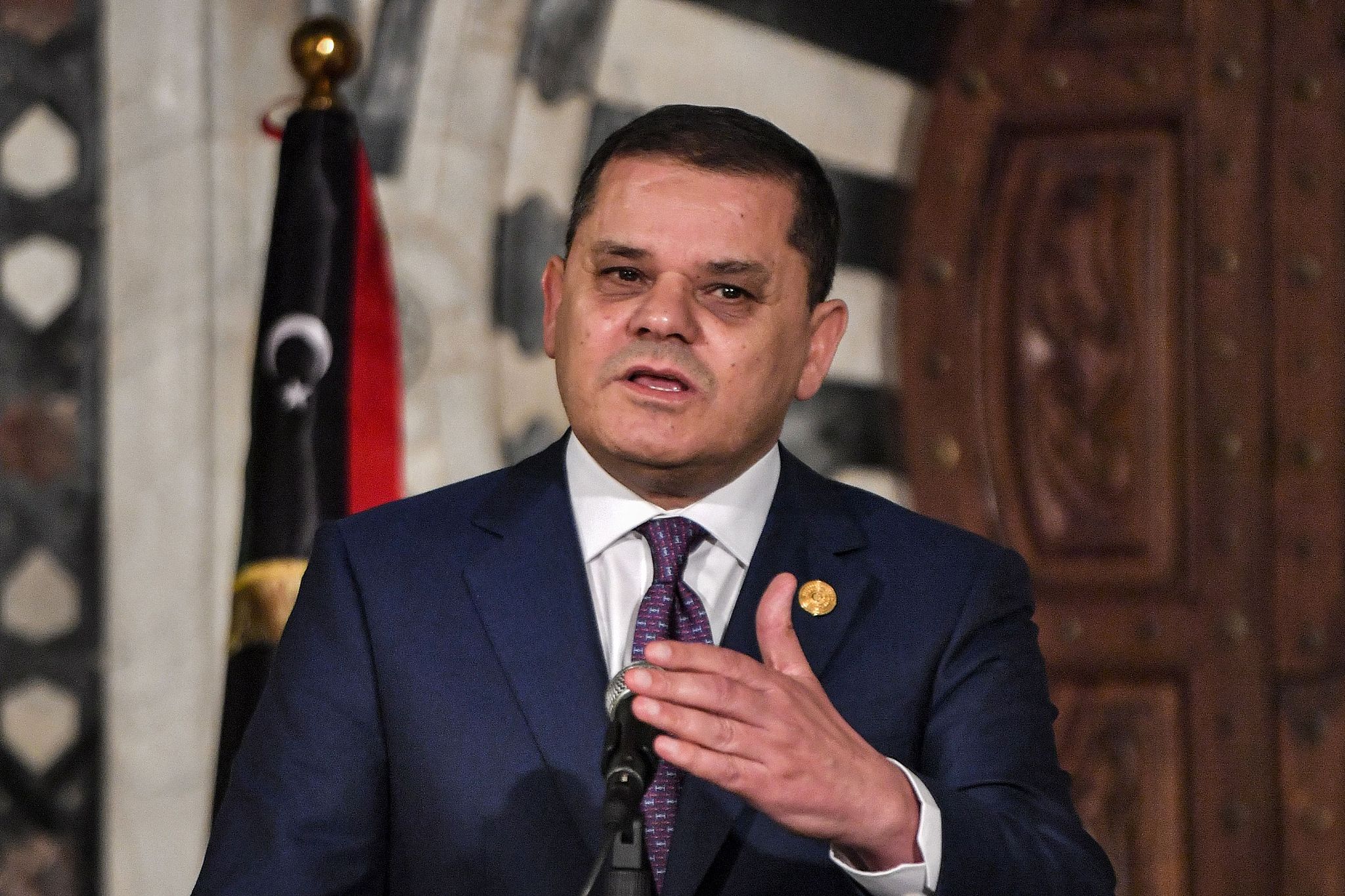 The Prime Minister of Libya's Government of National Unity, Abdul Hamid Dbeibeh, speaks at an event on November 30, 2022. /CFP