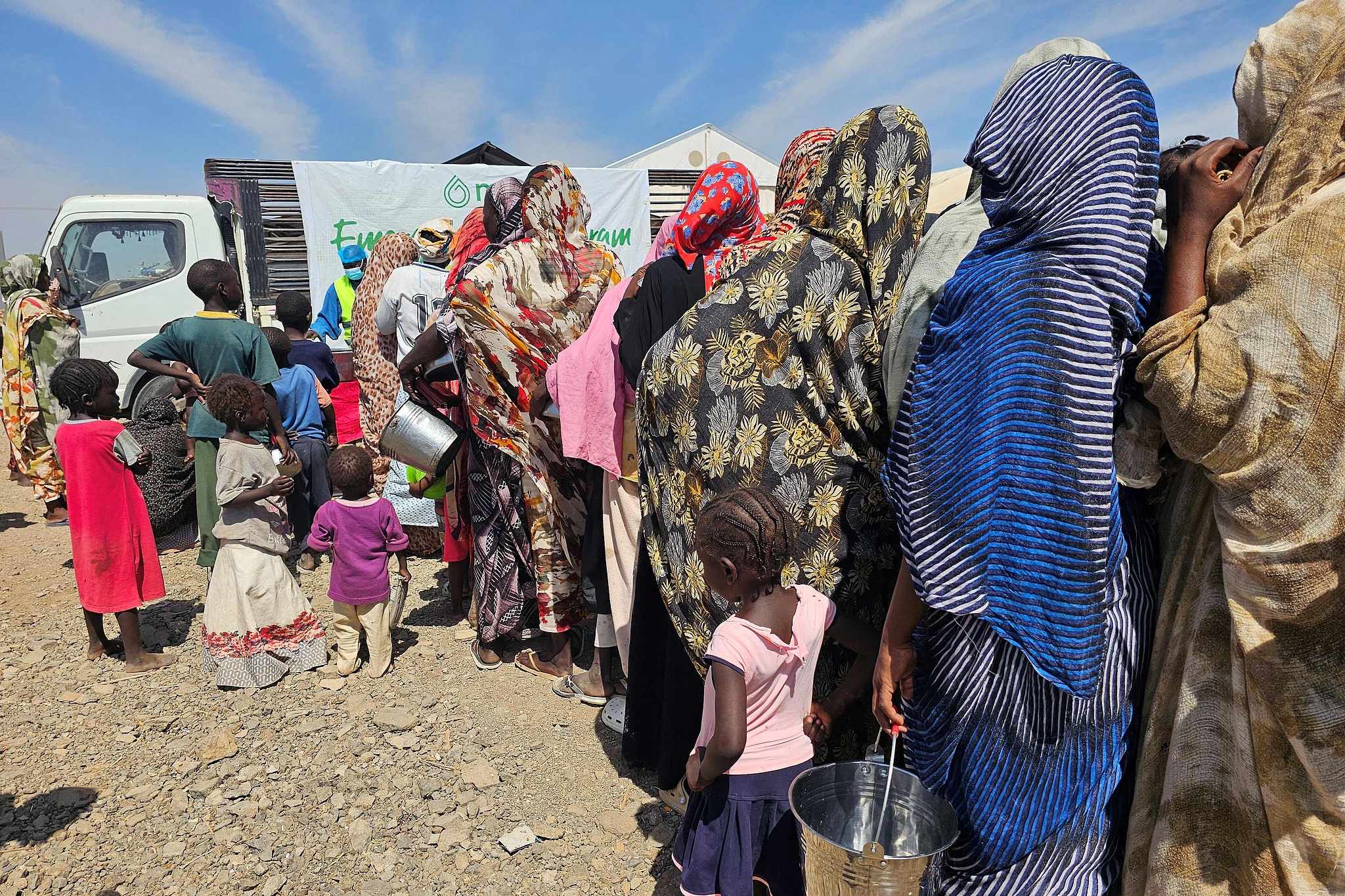 Displaced Sudanese civilians wait to receive humanitarian aid at Abunaga refugee camp, Gaddafi State, Sudan, on February 6, 2026. /CFP