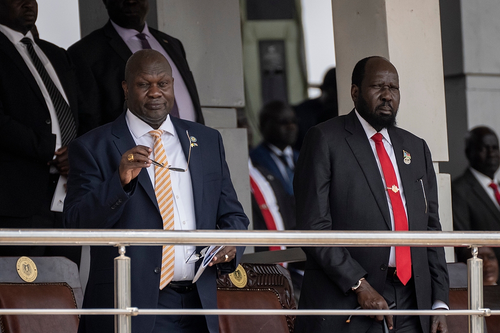 South Sudan's President Salva Kiir, right, and Vice President Riek Machar, left, attend a Holy Mass led by Pope Francis at the John Garang Mausoleum in Juba, South Sudan Sunday, February 5, 2023. /CFP