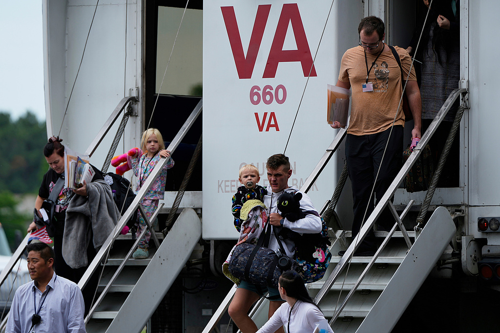 FILE PHOTO: Refugees from South Africa arrive at Dulles International Airport in Dulles, Va., on Monday, May 12, 2025. /CFP