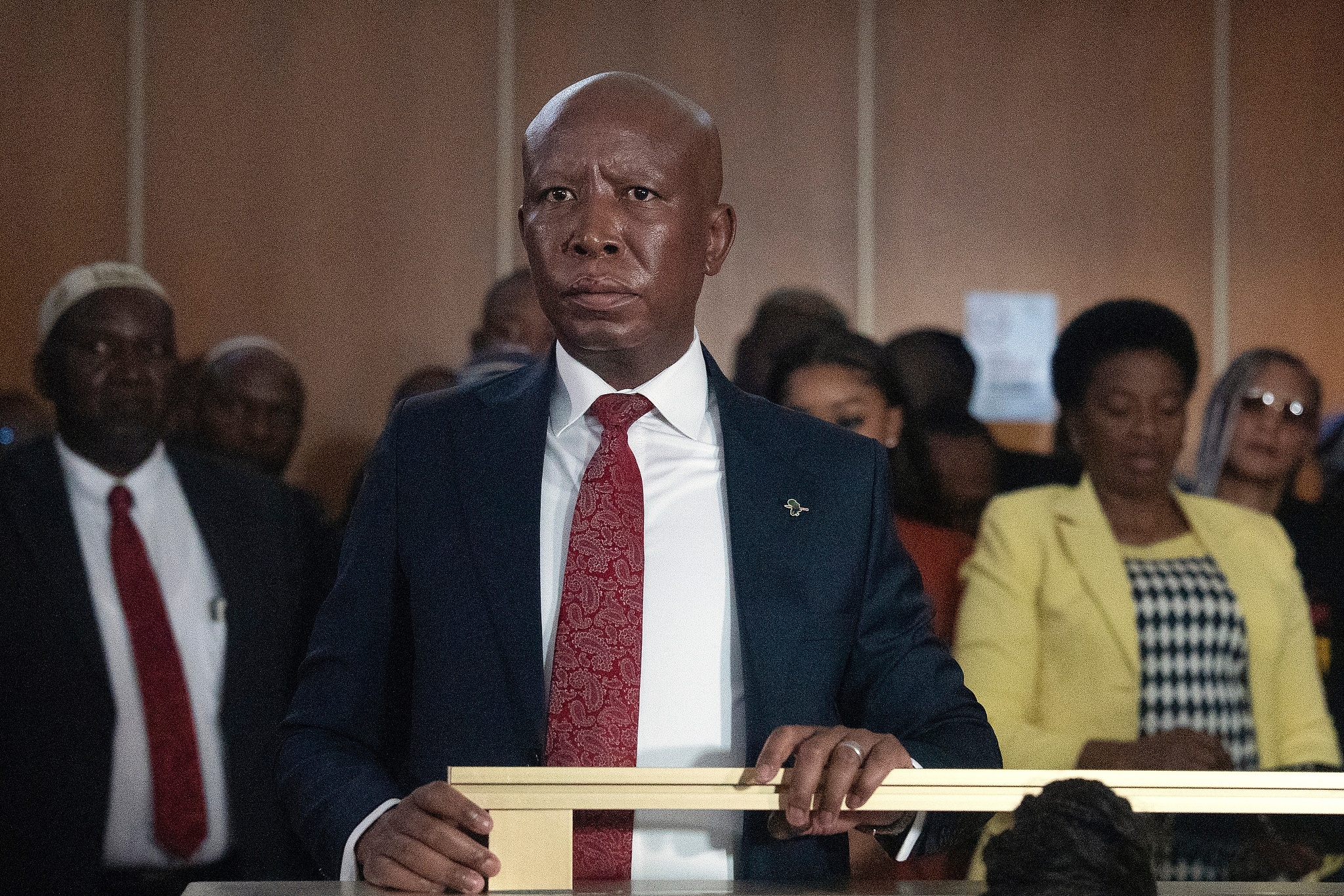 Julius Malema, leader of the Economic Freedom Fighters (EFF) party, stands in the dock during
his pre-sentencing hearing in East London, South Africa, on April 15, 2026. /CFP