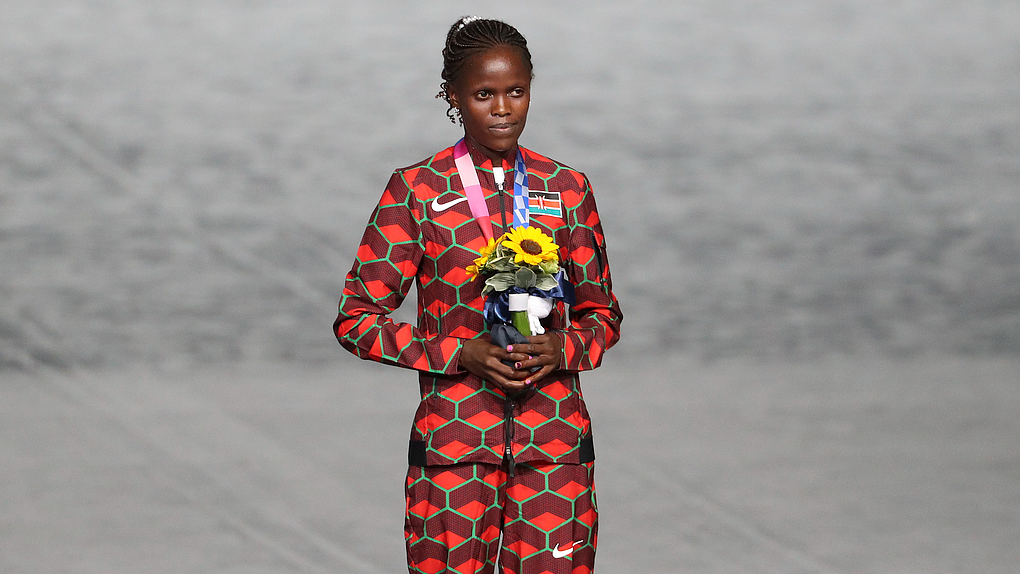 Olympic silver medalist Brigid Kosgei of Kenya poses with her medal after finishing second in the Women's Marathon Final at the Tokyo 2020 Olympic Games on August 8, 2021, in Tokyo, Japan. /CFP 