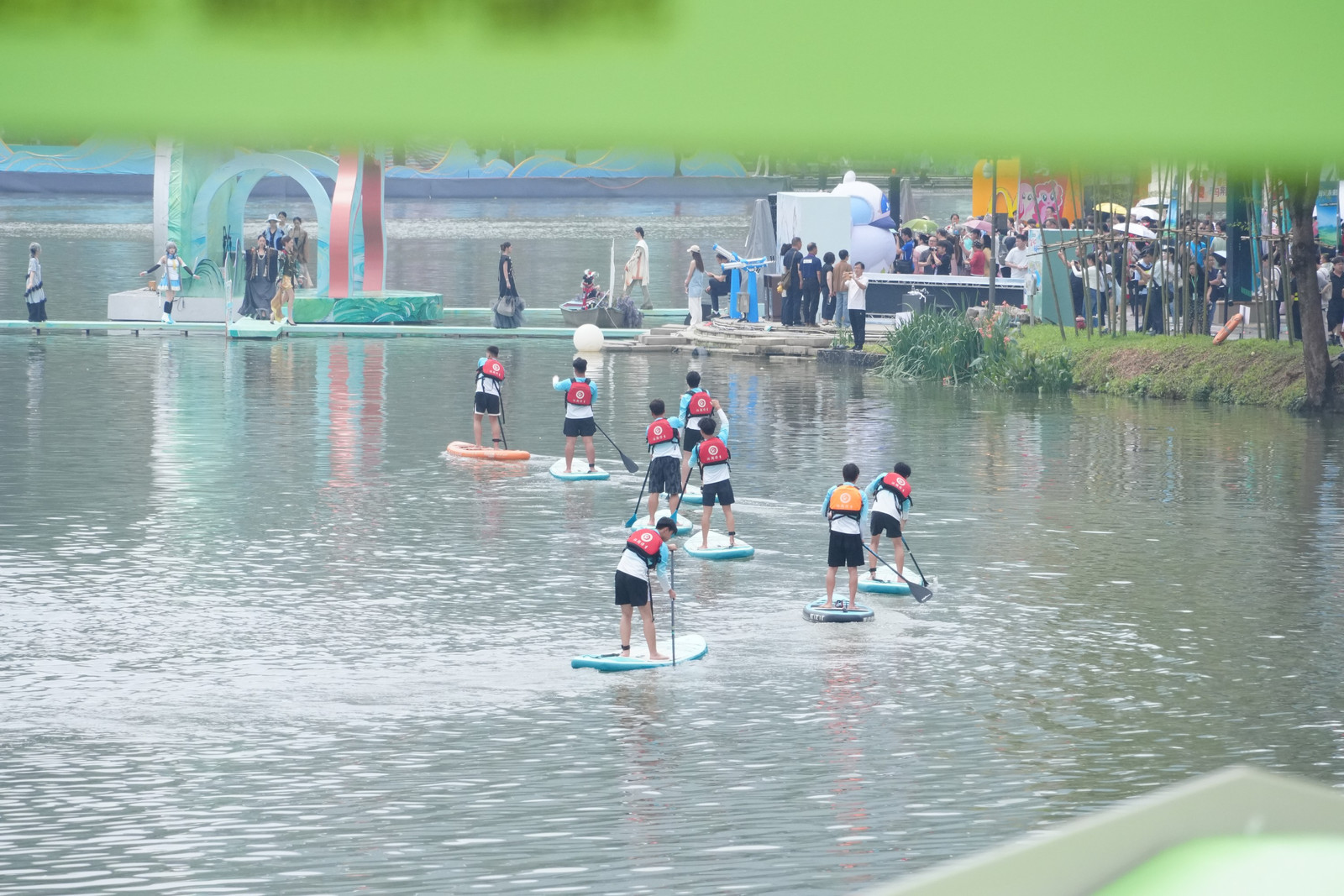 People from South China's Guangxi Zhuang Autonomous Region float on the river during the March 3 Festival, April 17, 2026. / CMG Guangxi Bureau
