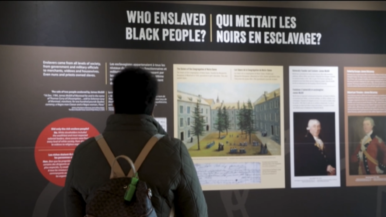 A visitor stands in front of Transatlantic Slave Trade exhibit at UN headquarters lobby on March 25, 2026./UN