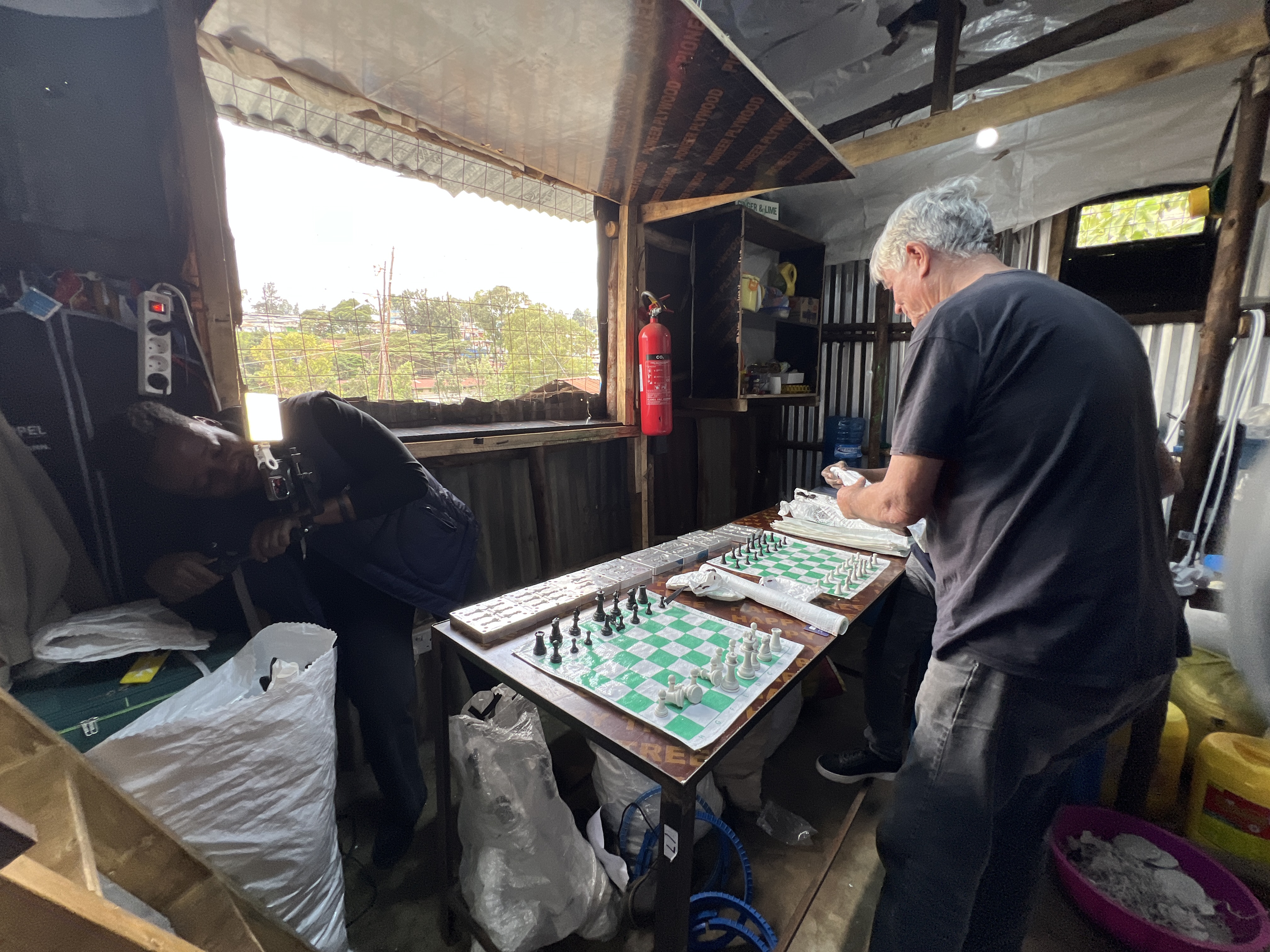 Richard Haukom packages finished chess pieces in Nairobi, Kenya, February 3, 2026. /Kijiji Solutions
